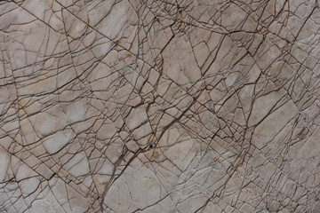 Rugged texture on stone background.