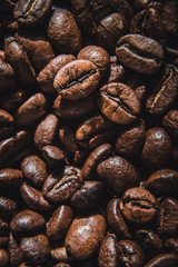 Coffee bean on top of other beans 