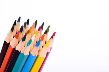 Colorful pencils pattern isolated on white background. Top view colorful of color pencils.Colored pencils, isolated on the white background. Color pencil with copy space isolated on white background,e