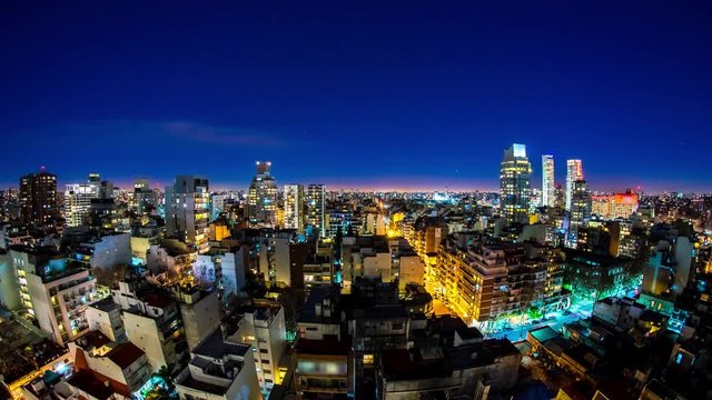 Night time-lapse view on the illuminated skyline of the city in Buenos Aires, Argentina.
