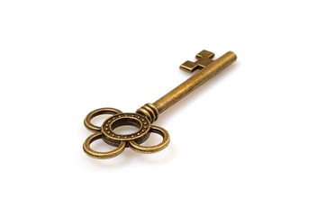 Golden key isolated on white background