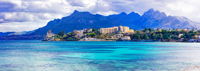 Obraz premium Amazing landscapes of Sicily -beautiful coastal town Santa Flavia with old castle . Italy