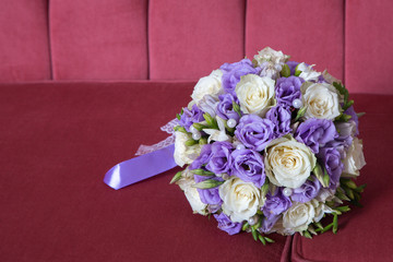 Wedding bouquet with purple and white flowers