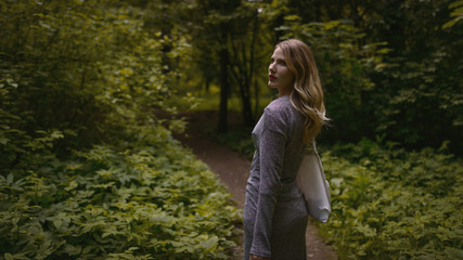 Outdoors portrait of beautiful young woman. Selective focus.