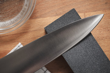 Knife sharpen with professional sharpening whetstone - top view