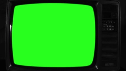 Old Television with Green Screen. Black and White Tone. Ready to Replace Green Screen with Any Footage or Picture you Want. You Can Do it With “Keying” (Chroma Key) Effect. Zoom In. Close-Up. Full HD.