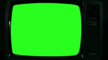Old Television with Green Screen. Iron Tone. Ready to Replace Green Screen with Any Footage or Picture you Want. You Can Do it With “Keying” (Chroma Key) Effect. Zoom In Close-Up. Full HD. 