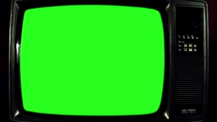 Old Television with Green Screen. Blue Steel Tone. Ready to Replace Green Screen with Any Footage or Picture you Want. You Can Do it With “Keying” (Chroma Key) Effect. Zoom Out. Close-Up. Full HD. 