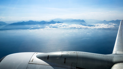 Airplane above clouds