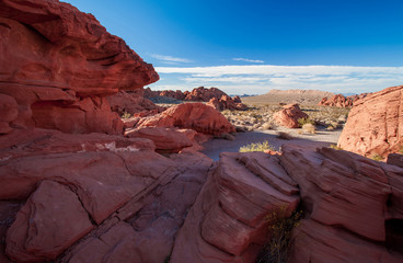 Rock formations in the Nevada desert at Valley of Fire State Park, USA. Valley of Fire State Park is the oldest state park in Nevada, USA and was designated as a National Natural Landmark in 1968.