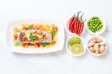 Steamed Grouper Fish Fillet with Chili Lime Sauce in lime dressing