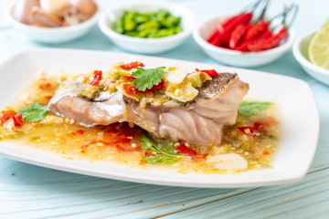 Steamed Grouper Fish Fillet with Chili Lime Sauce in lime dressing