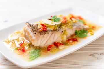 Steamed Grouper Fish Fillet with Chili Lime Sauce in lime dressing
