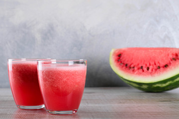 Watermelon smoothie on wood background , healthy drink. Summer. Watermelon pieces.