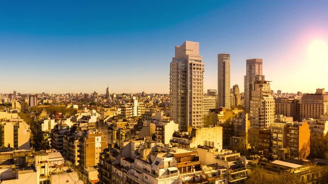 Time-lapse view on the skyline of the city as colorful clouds pass by in the light of the setting sun in Buenos Aires, Argentina.
