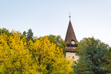 Avas Church and bell tower in Miskolc in autumn colors on top of Avas Hill