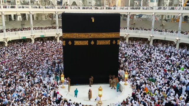 4K footage Muslim pilgrims circumambulate the Kaaba at Masjidil Haram in Makkah, Saudi Arabia. Muslims all around the world face the Kaaba during prayer time.