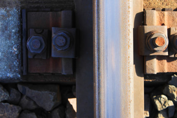 Railroad Track Top View of Concrete Sleepers, Gravel Crushed Stones and Metal Rail Close Up. Train...