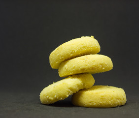 butter biscuits on a black background