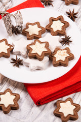Holiday concept with red napkin, cookies and spices