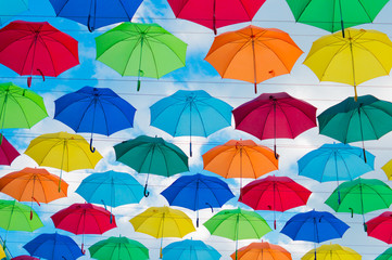hanging colorful umbrellas on a sunny day