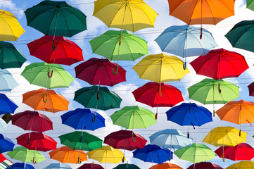 Fototapeta na wymiar so many multicolored umbrellas