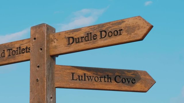 Direction signs to Durdle Door in Devon - a famous landmark near Dorset