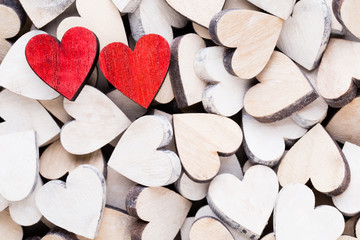 Obraz premium Background with wooden hearts, place for text.