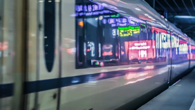 Modern high speed passenger train leaves Station in Shanghai, China.