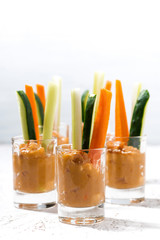 pumpkin hummus and fresh vegetables, vertical