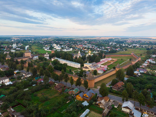 Scenic panoramic view of Suzdal, Russia. St Euthymius Monastery at the small river. Suzdal is a famous tourist attraction and part of the Golden Ring of Russia. Beautiful panorama of Suzdal in summer