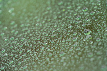 rain drops on car glass with hydrophobic coating macro photo
