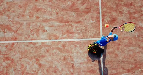 Fototapeten Aerial tennis serve. © rades