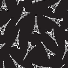 Seamless pattern. Modern design print fabric. Illustration white ink Eiffel Tower. Abstract ornament hand drawing. Vector illustration is isolated on a black ground.