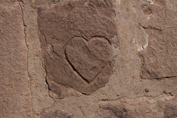 lovely heart cut in stone street, close up