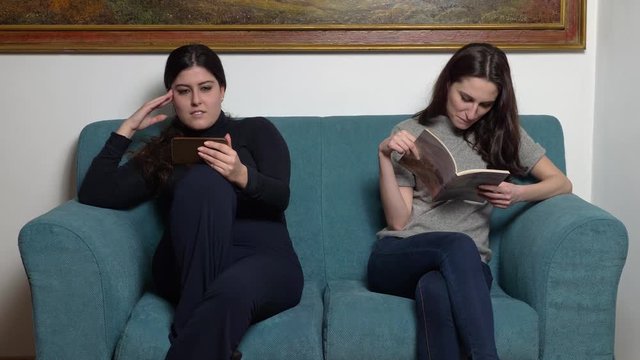 waiting room: woman disturbing the neighbor by laughing and using the smartphone