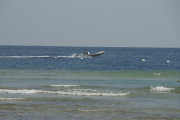 Speed boat on Red Sea coral riffs for diving and infrastructure