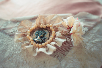 Delicate composition with old brooch decorated in rustic style