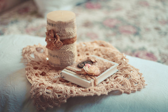 Delicate composition with old books decorated in rustic style