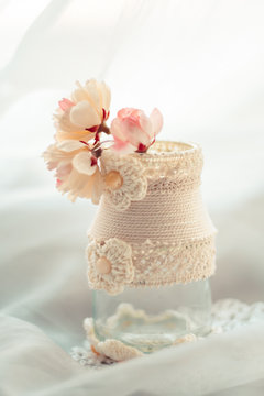 Delicate composition with flowers in a vase