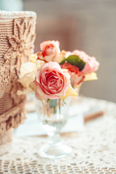 Delicate composition with flowers in a vase
