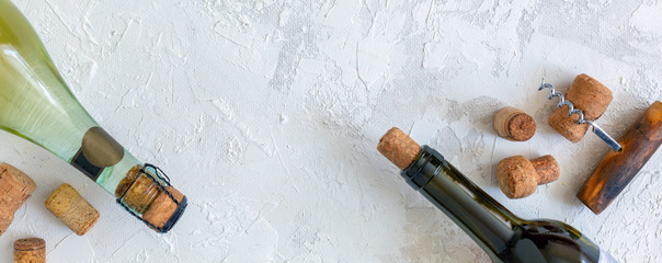 Bottles, wine stoppers and vintage corkscrews.