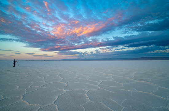 Car Tracks Lead Past A Spectator On The Bonneville Salt Flats