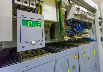 Technical display on control panel with electric devices and light screen  with amount power of ...