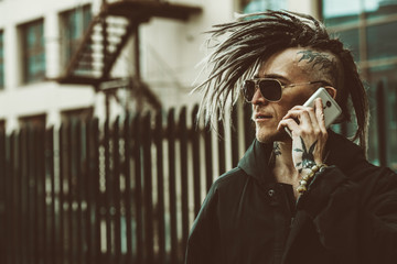 punk man on phone