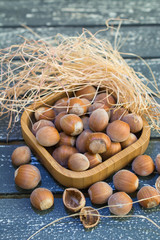 Hazelnuts in shells on the table