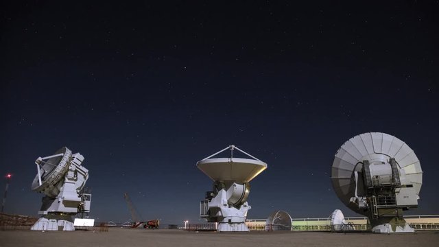 Radio Satellite Dishes rotating at Night