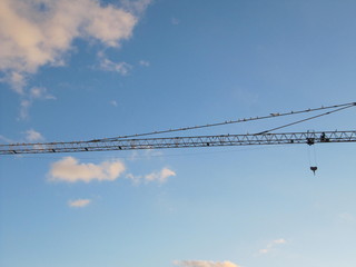 crane high in the sky above the streets of ibiza 