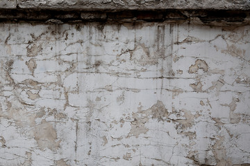 Old white grunge wall background or texture.