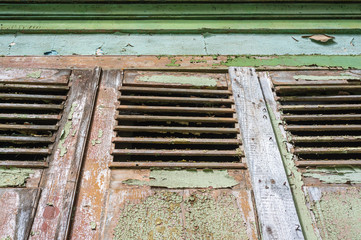 Fragment of green vintage old window. Textural background. Jurmala, Latvia